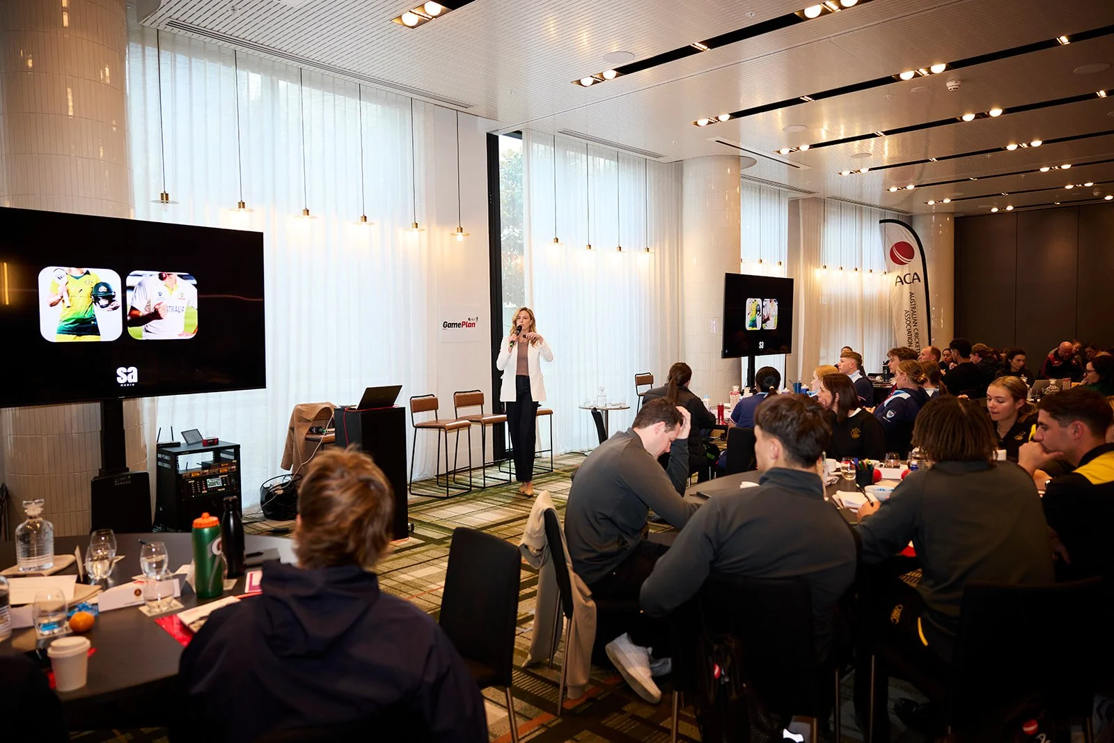 Sarah Ashmore running a media training for first year professional athletes