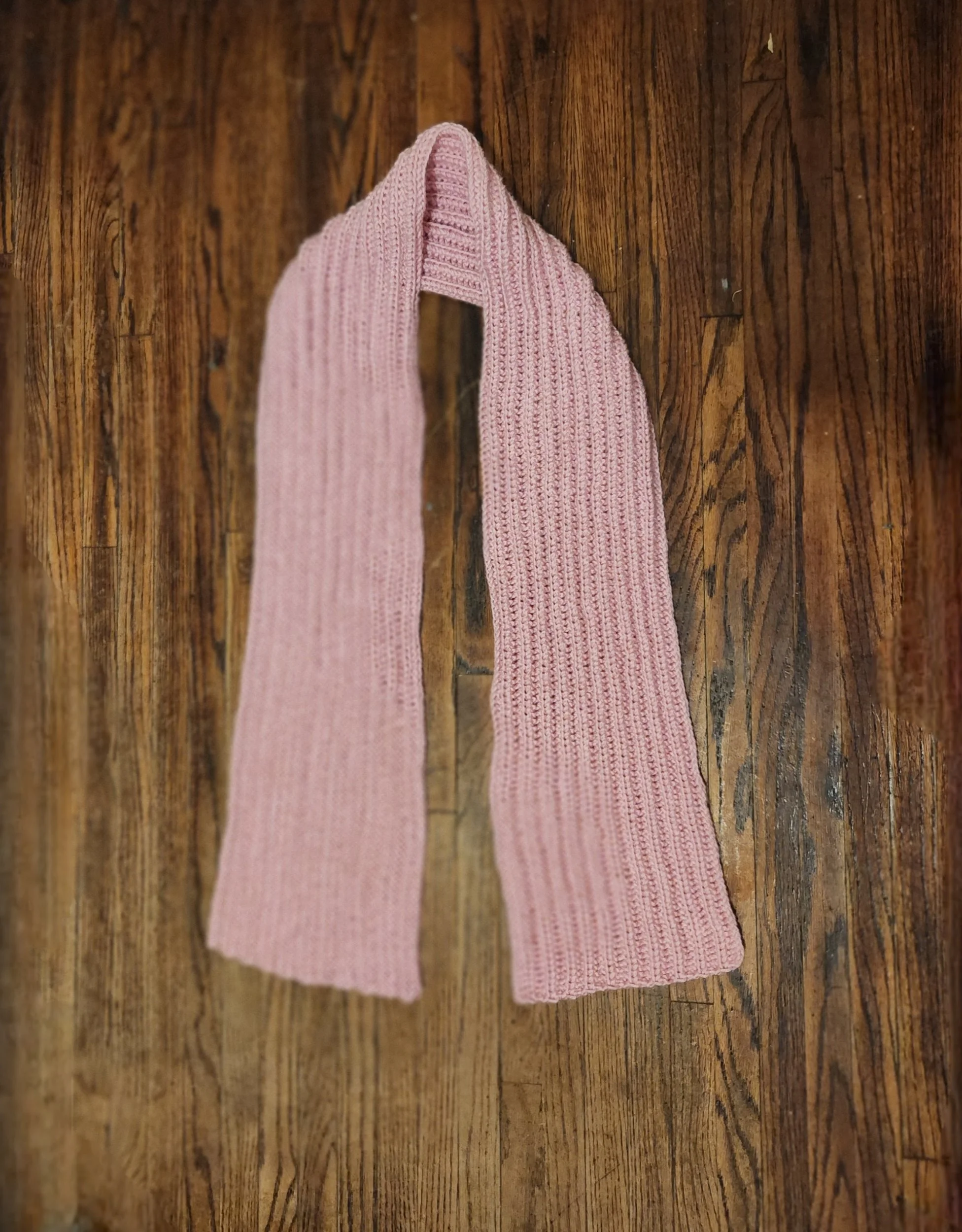 Handmade custom lacy scarf in pink, flat lay without tassels showing lace detail