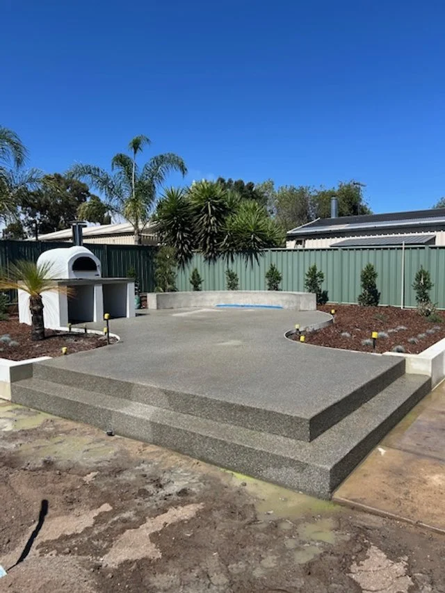 Newly laid concrete slab patio.