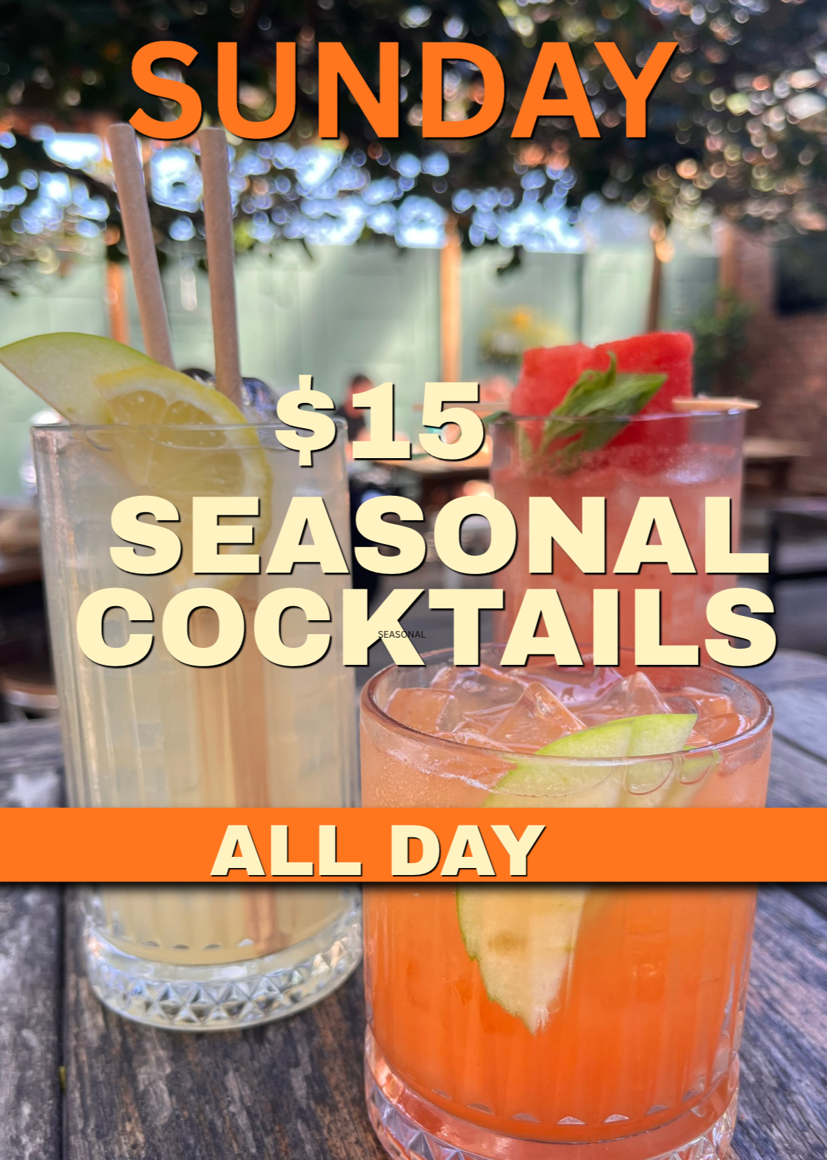 Two Bloody Mary cocktails garnished with celery, basil, and lemon, sitting on a dark surface, advertising a $12 Bloody Mary special all day on Sunday.