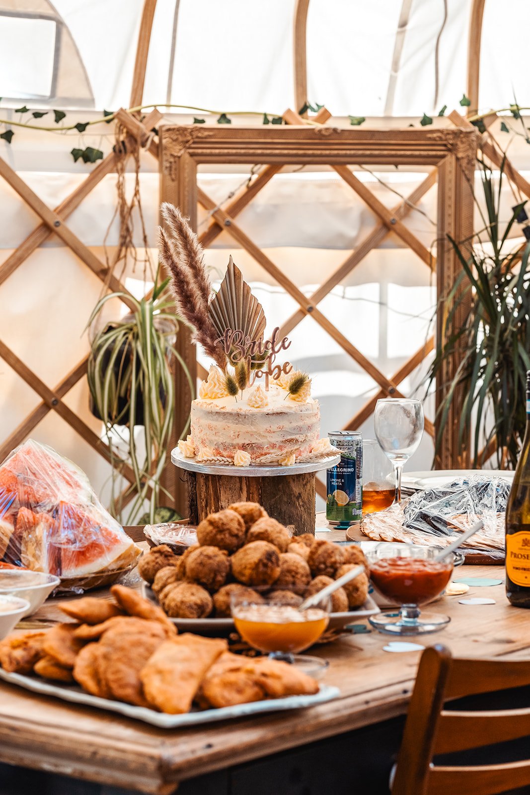 A dessert table with a cake that has a