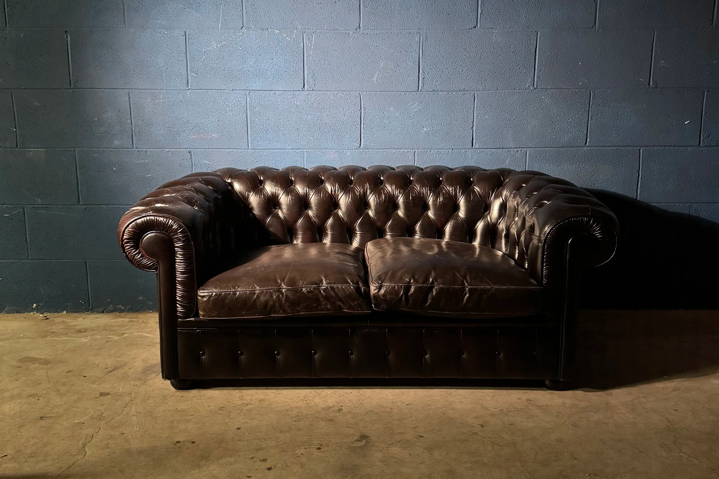 Divano Chesterfield in pelle vintage