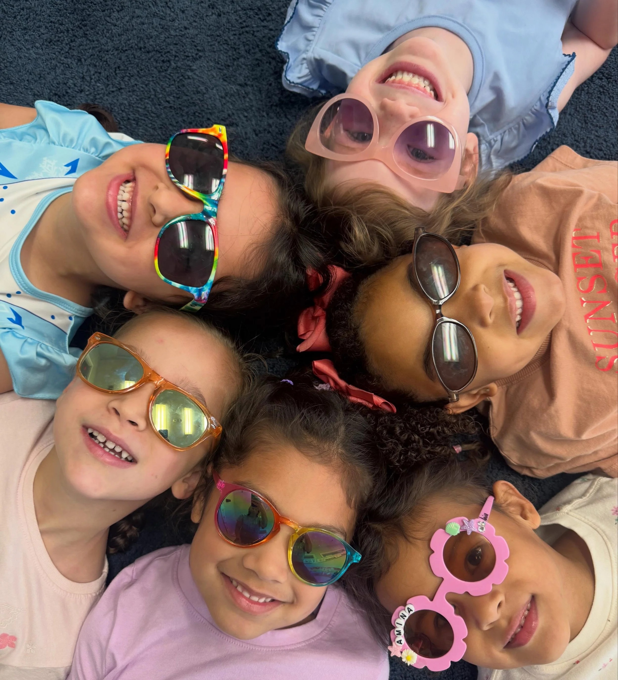 😎☀️ Sunglasses Day at Evergreen! ☀️😎

Today at Evergreen Bilingual Learning Center we are celebrating Sunglasses Day in the most fun way possible! While showing off our cool shades and enjoying summer fun together, our children are also reviewing i