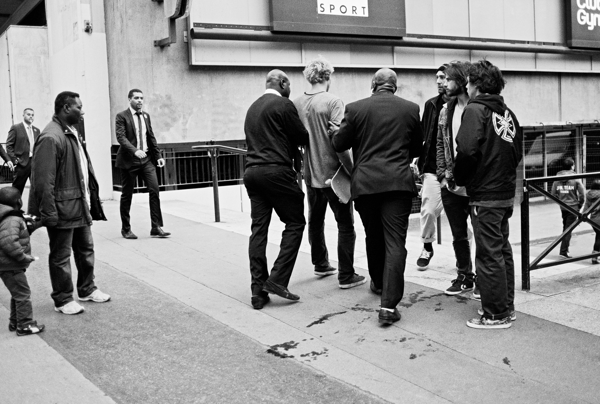 Sebi_Dragged_Away_By_Security_AdobeRGB_9775_B&W_NEW.jpg