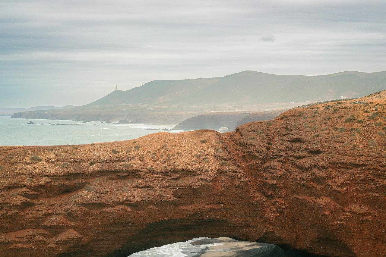 Red rock arch on Legzira Beach in Morocco
