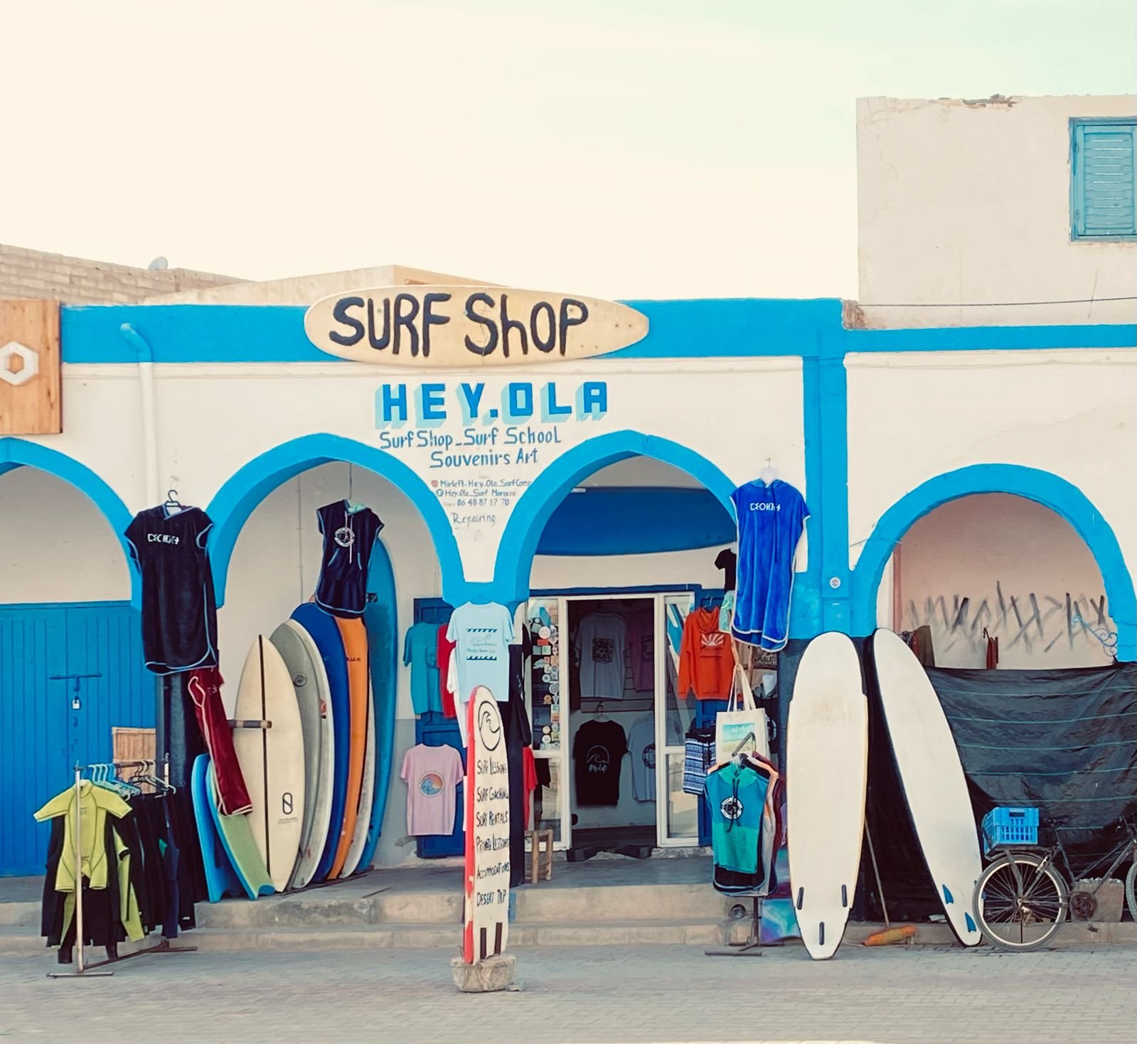 HEY.OLA surf shop with surfboards and beachwear