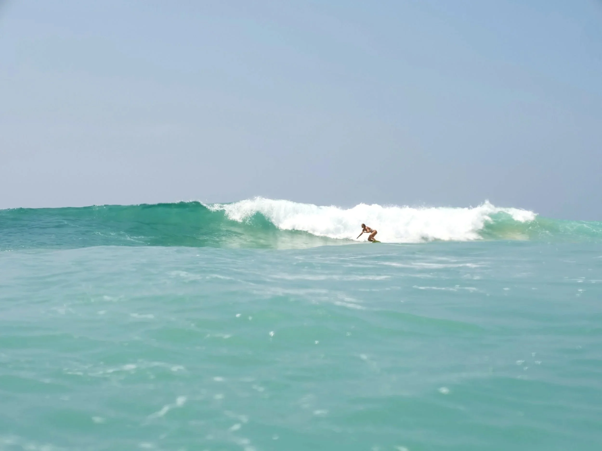 Fear in big waves? Start surf mental training to be confident in bigger waves.