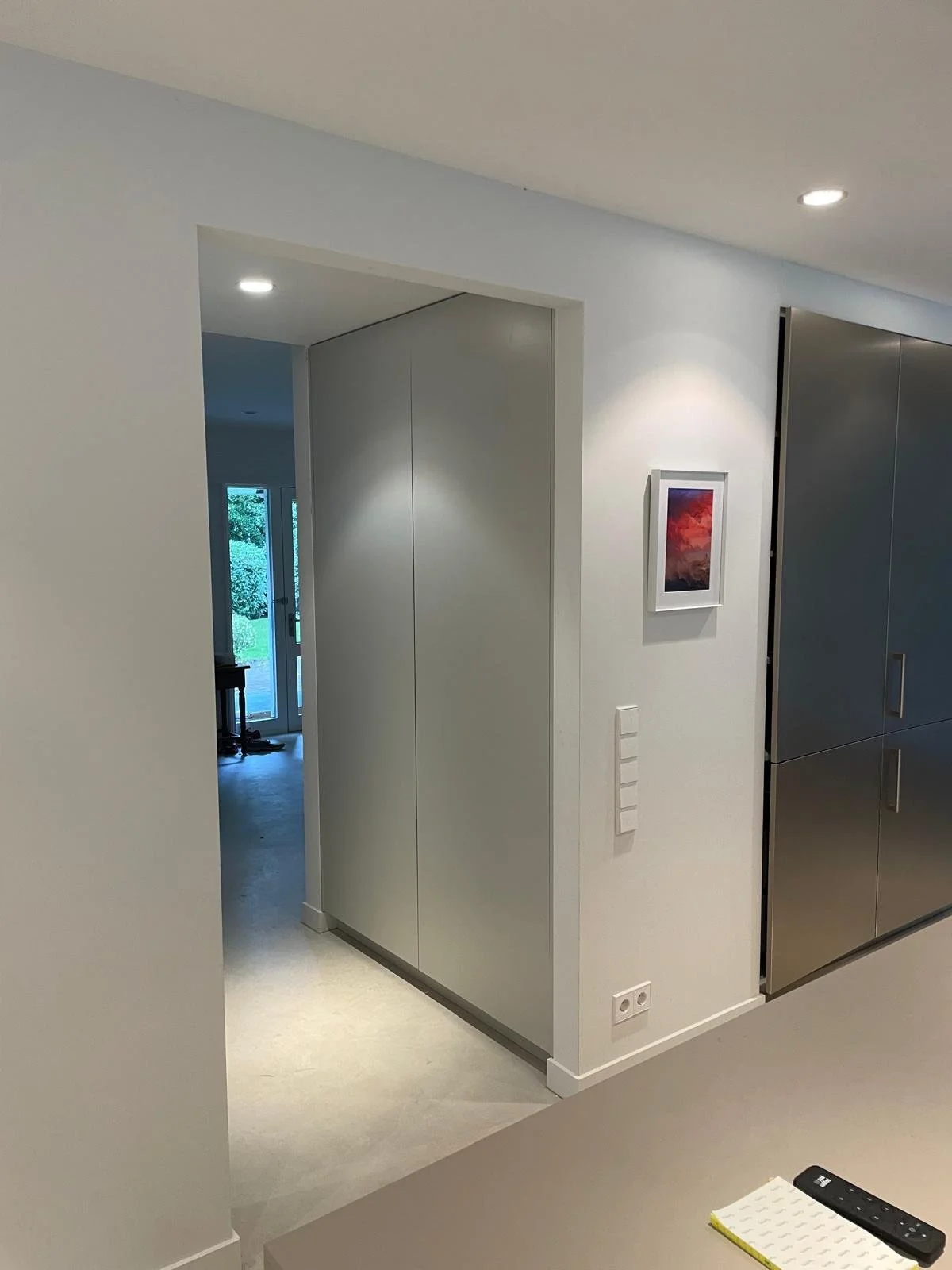 Sleek and modern custom cabinets. Entry way renovation.