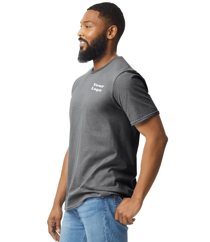 Side view of a smiling man with a beard wearing a dark gray t-shirt with 'Your Logo' printed on it and blue jeans.