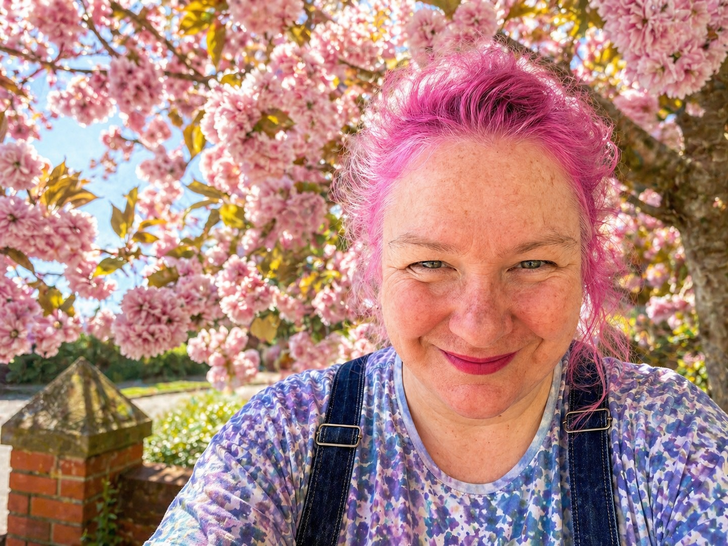 Jennifer under the Cherry Blossom Tree at Home Smiling