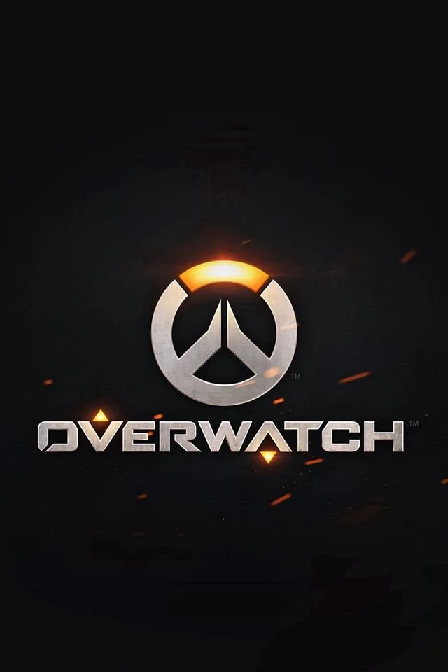 Overwatch video game logo with a metallic emblem and orange accents on a dark background.