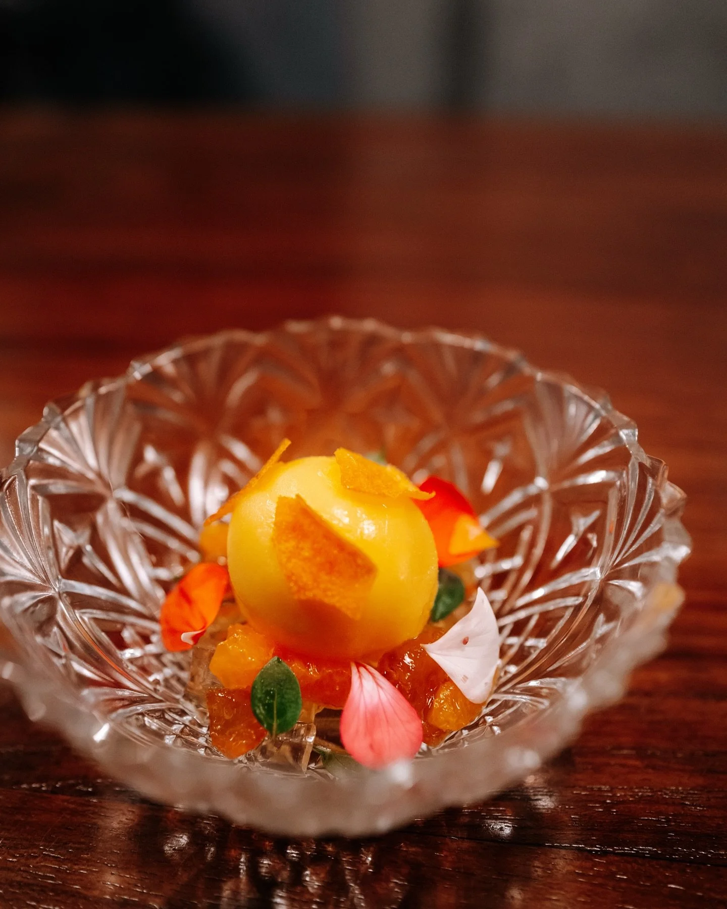 Flavours of citrus, a reflection of summer&rsquo;s brightness.

This dessert brings together four expressions of citrus:
Tangerines, turned into a sorbet and crisp candied tuile.

Kumquats, gently confit for their sharp clarity.
Mandarins, served fre