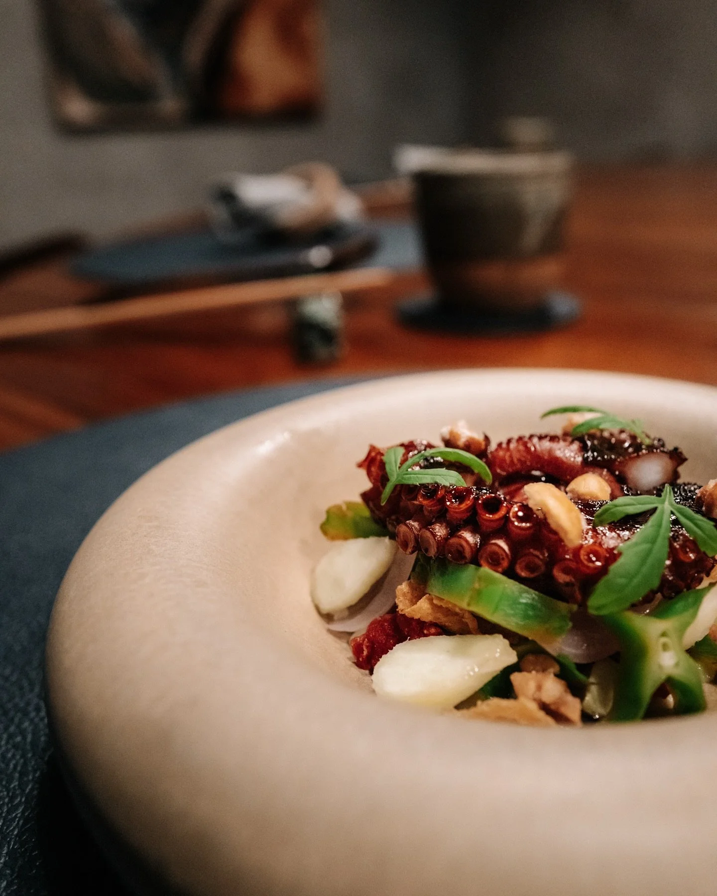 Octopus with som tam and petai
A dish by Chef Jia Wan inspired by two favourites, the sharp tang of som tam and the bold taste of petai beans

The octopus is caught from the waters of Indonesia where the warmer currents and coastal seabeds lend a dis