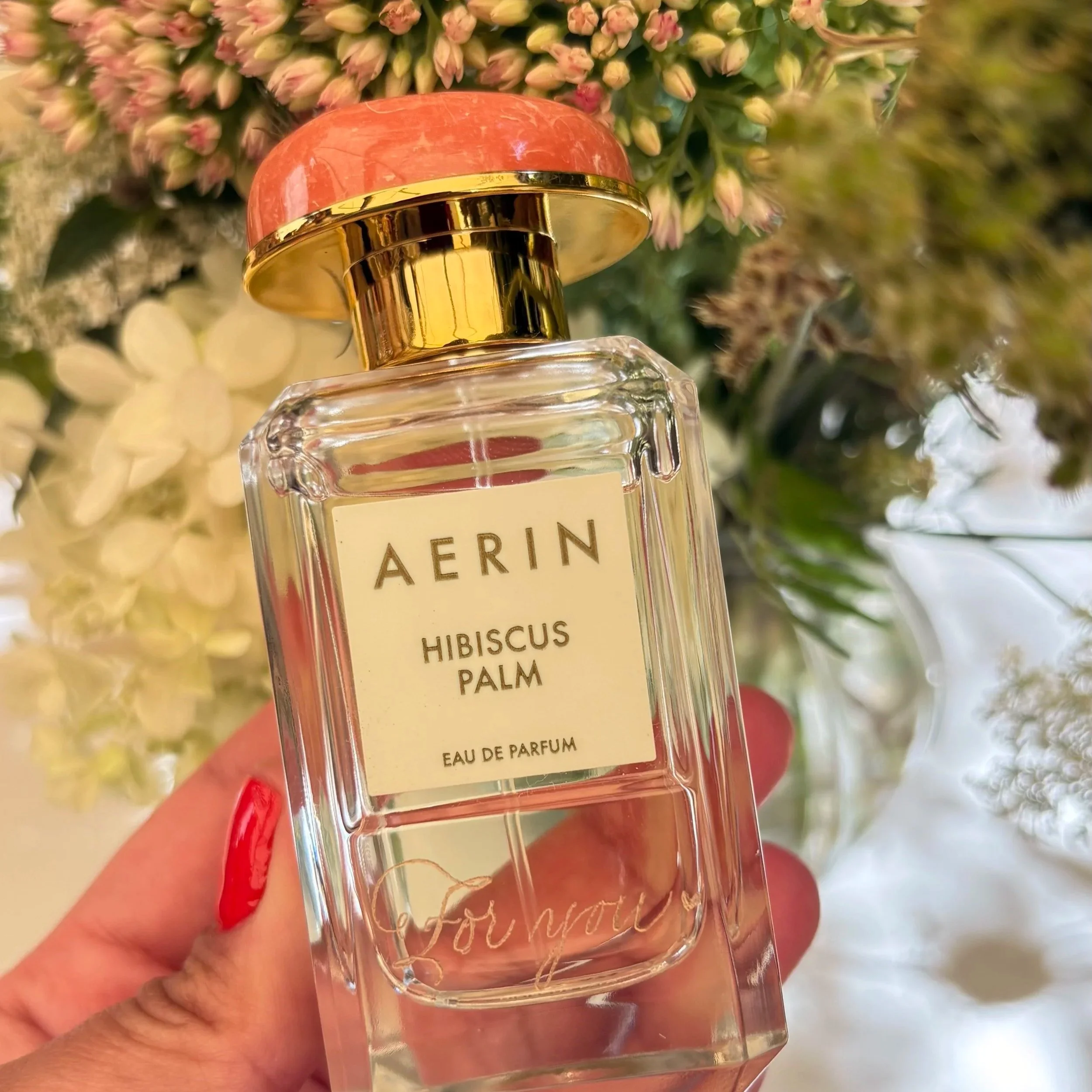 Hand-engraved perfume bottles for Aerin during an exclusive event in Zurich.
