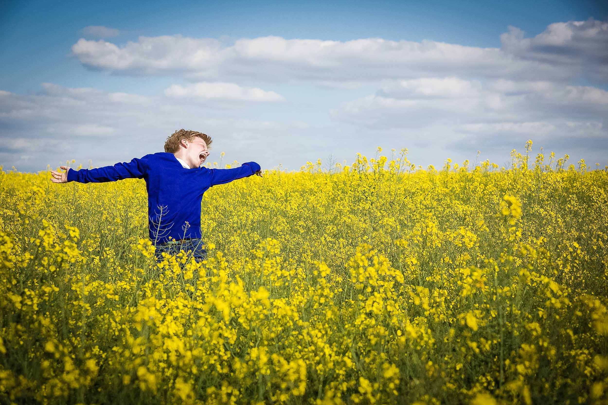 Happy in a field