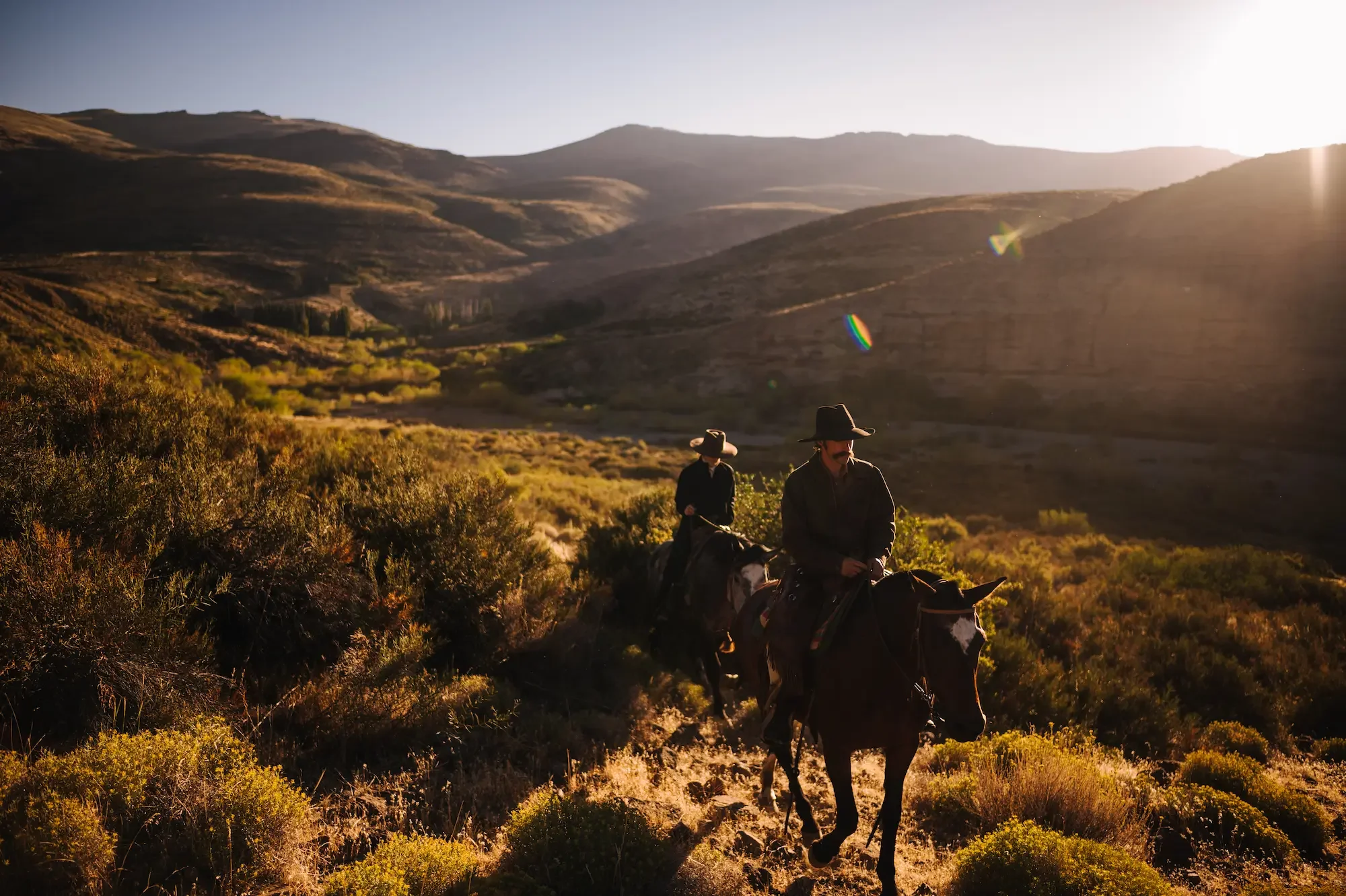 Riding horseback into Estancia Ranquilco in northern Patagonia, Argentina.