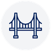 Icon of a suspension bridge in a circular frame.