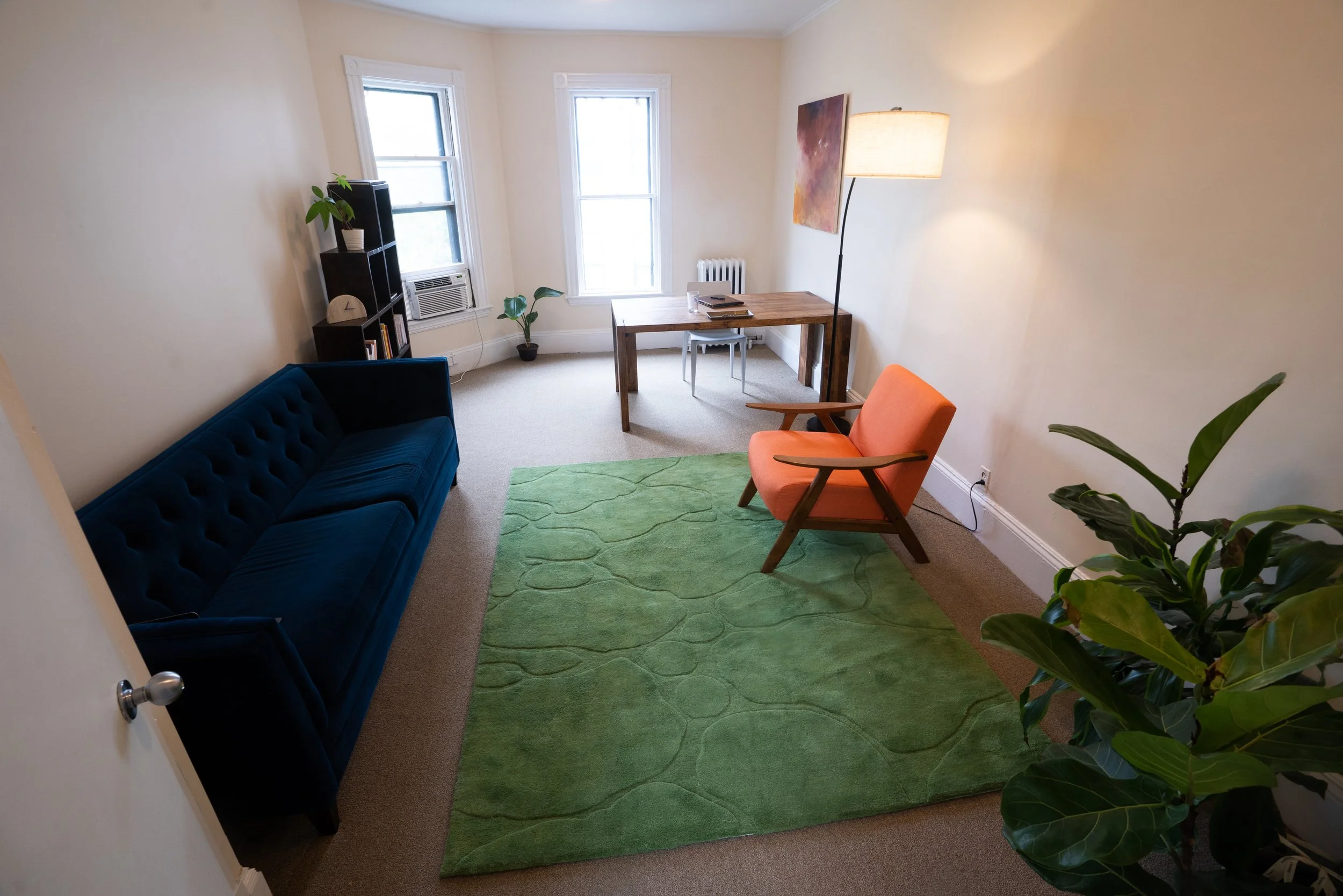 Sun-filled office at Mosaic Counseling Center in Cambridge, MA providing a safe space for Christian men’s addiction therapy.