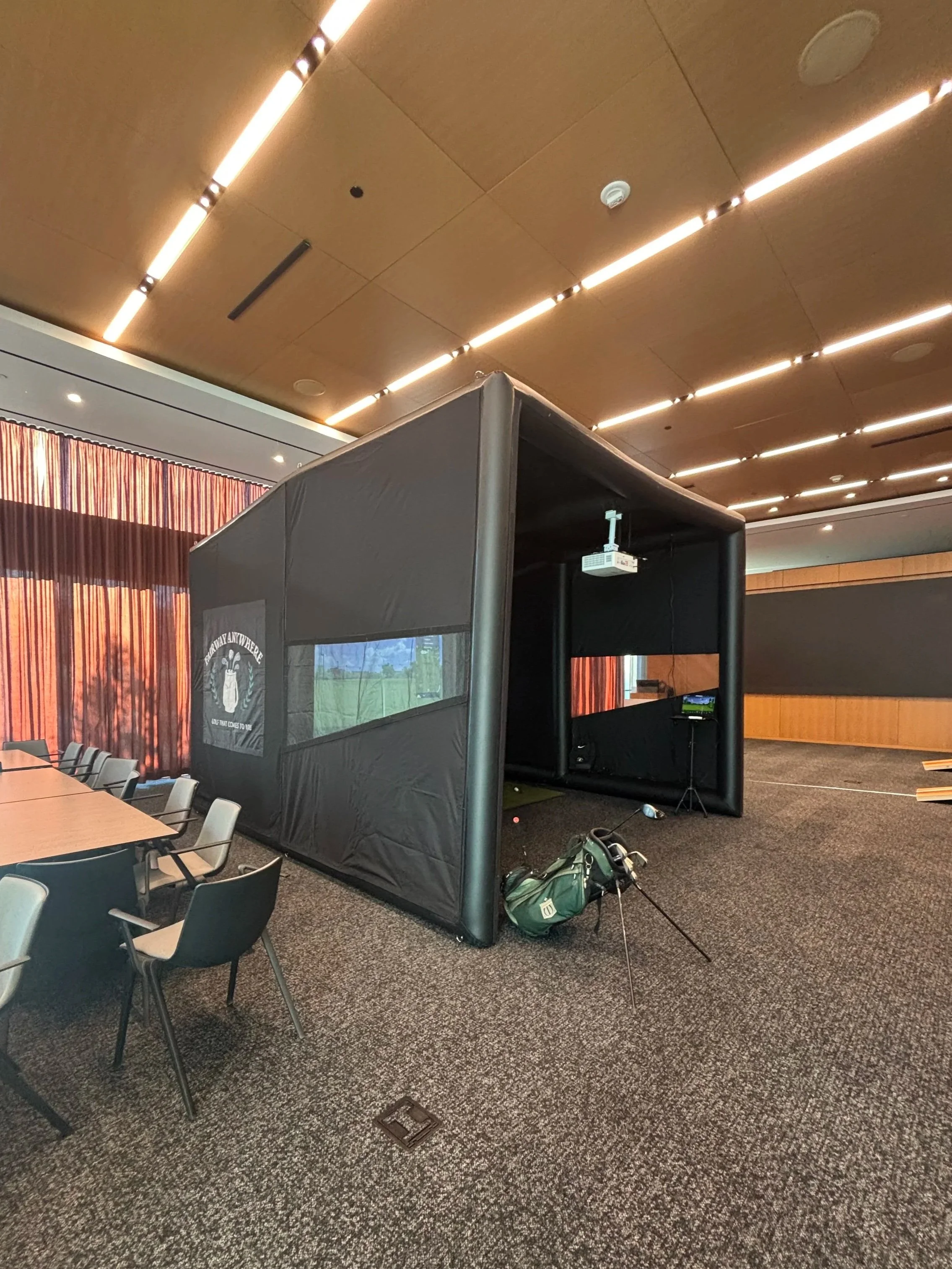 Golf simulator at corporate event