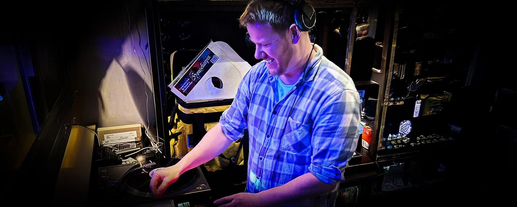 Walter Vooys at the turntables playing a guest DJ set at Amsterdam Vinyl Club, a live music community event.