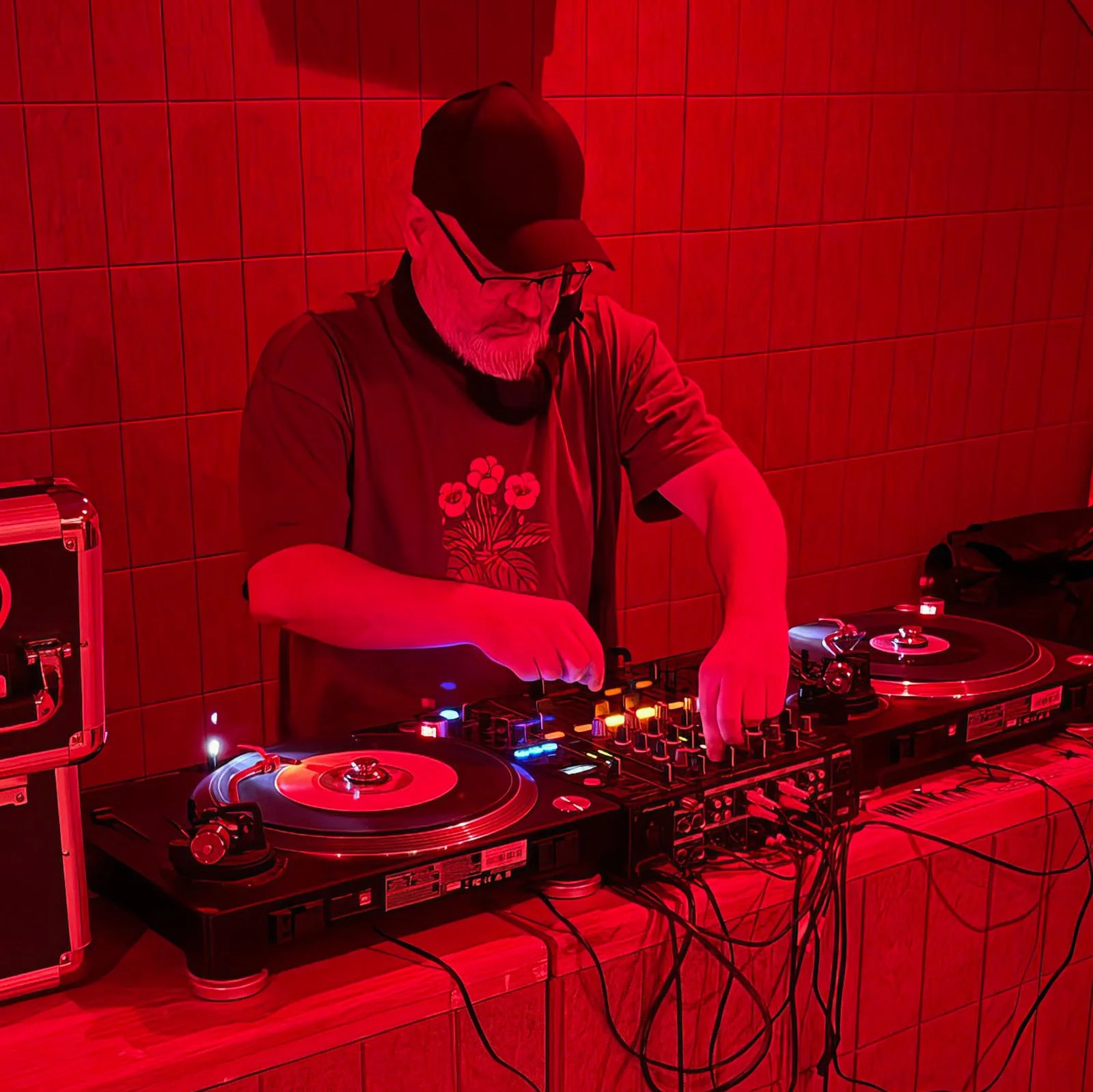 DJ Fresh Fruit at the turntables playing a guest DJ set at Amsterdam Vinyl Club, a live music community event.