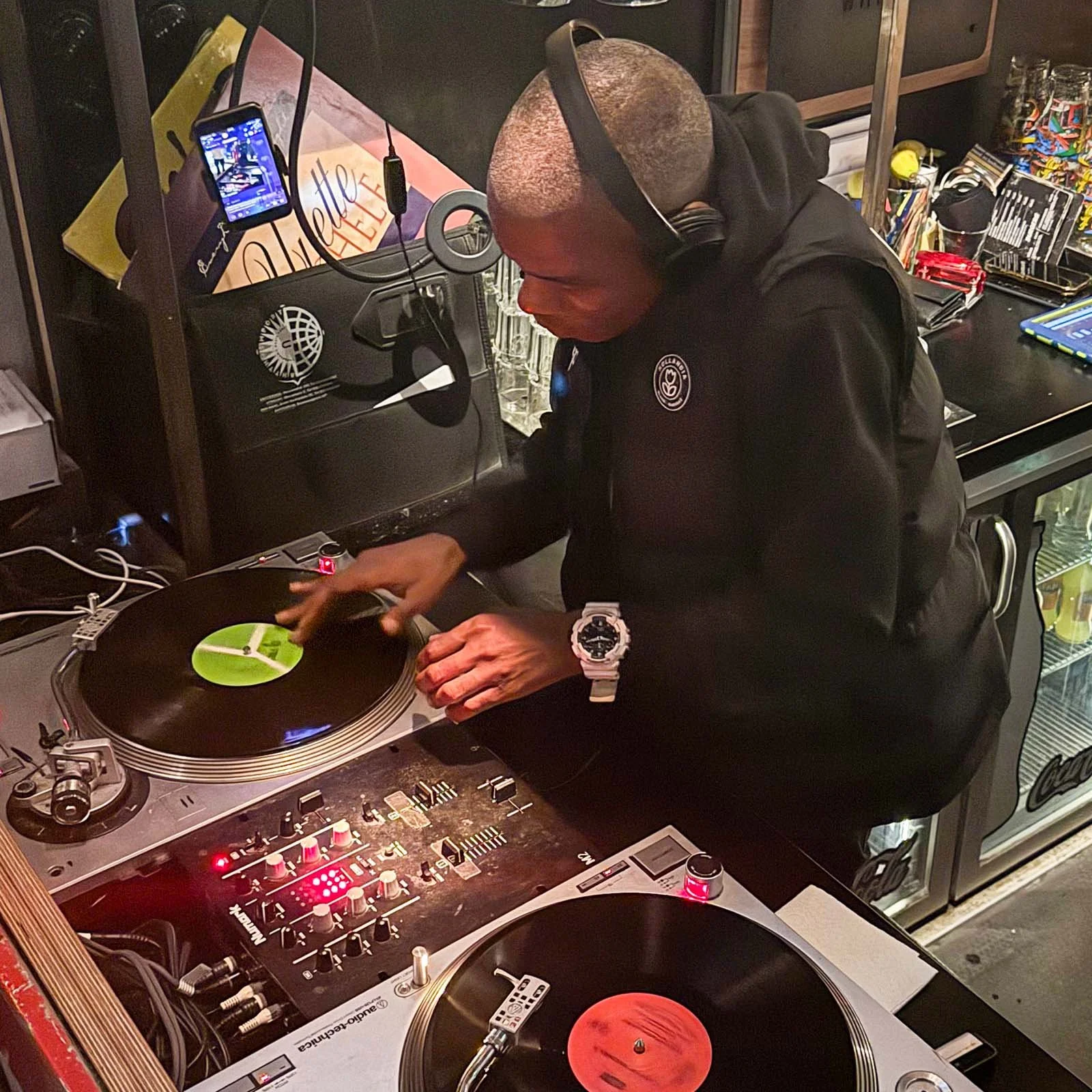 DJ Fresh at the turntables playing a guest DJ set at Amsterdam Vinyl Club, a live music community event.