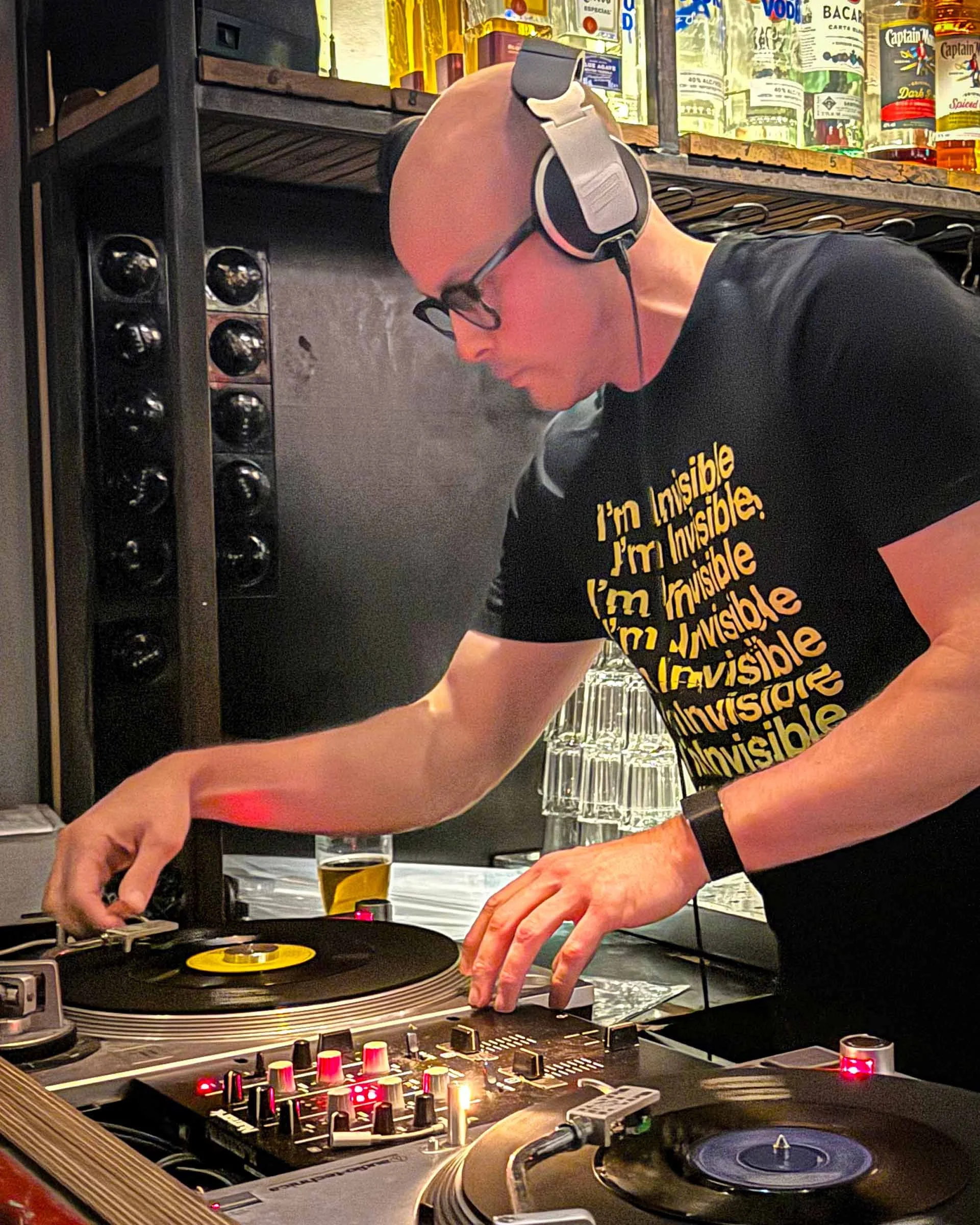 Rob at the turntables playing a guest DJ set at Amsterdam Vinyl Club, a live music community event.
