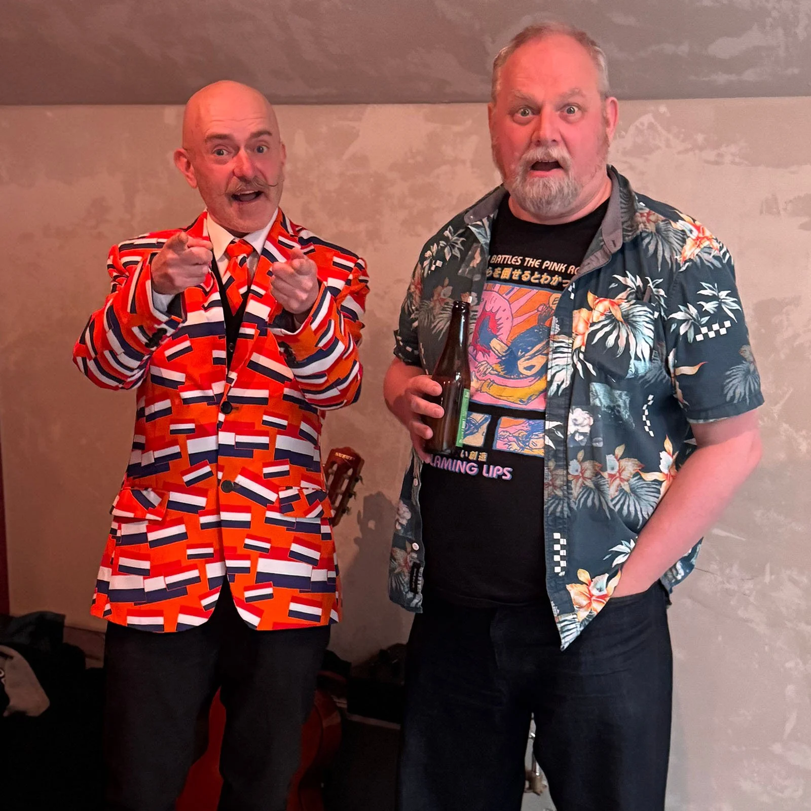 DJ Roland and friend enjoying a drink at an Amsterdam Vinyl Club live event.