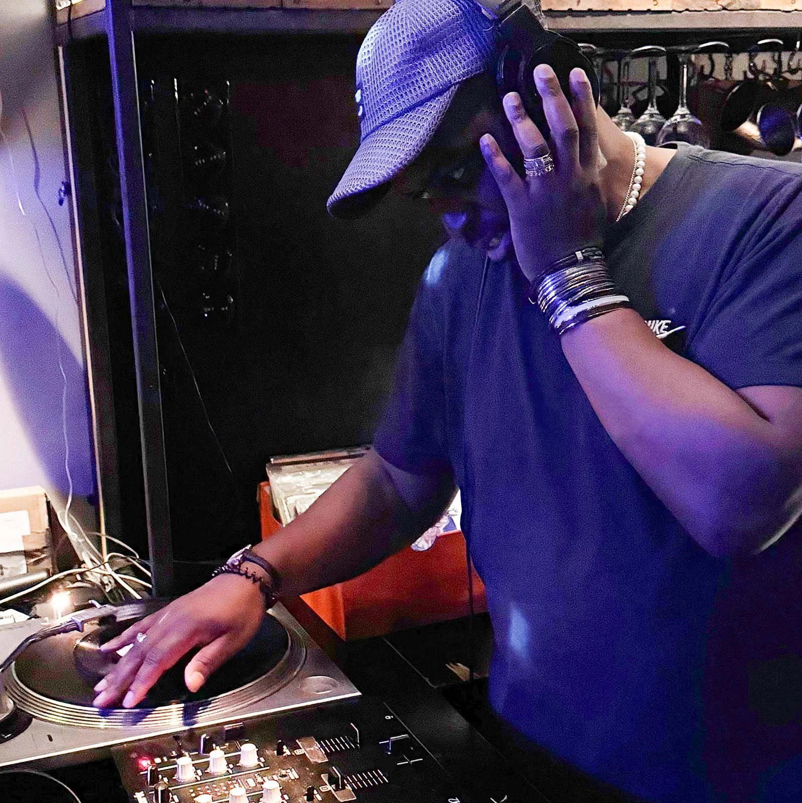 DJ Tea & 2 Sugars at the turntables playing a guest DJ set at Amsterdam Vinyl Club, a live music community event.