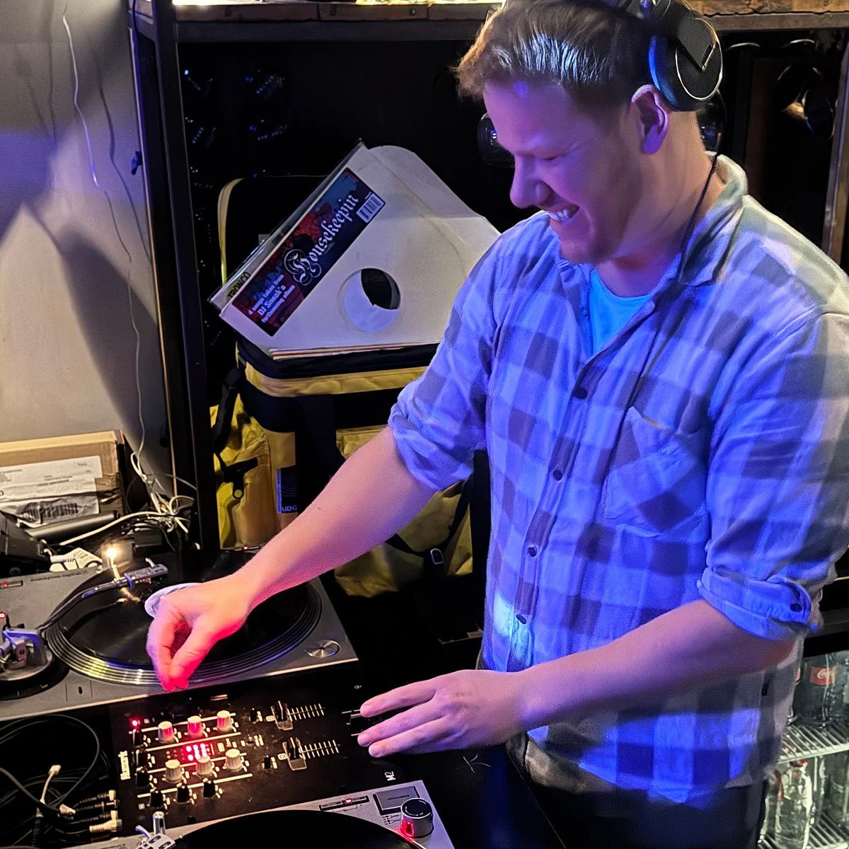 Walter Vooys at the turntables playing a guest DJ set at Amsterdam Vinyl Club, a live music community event.