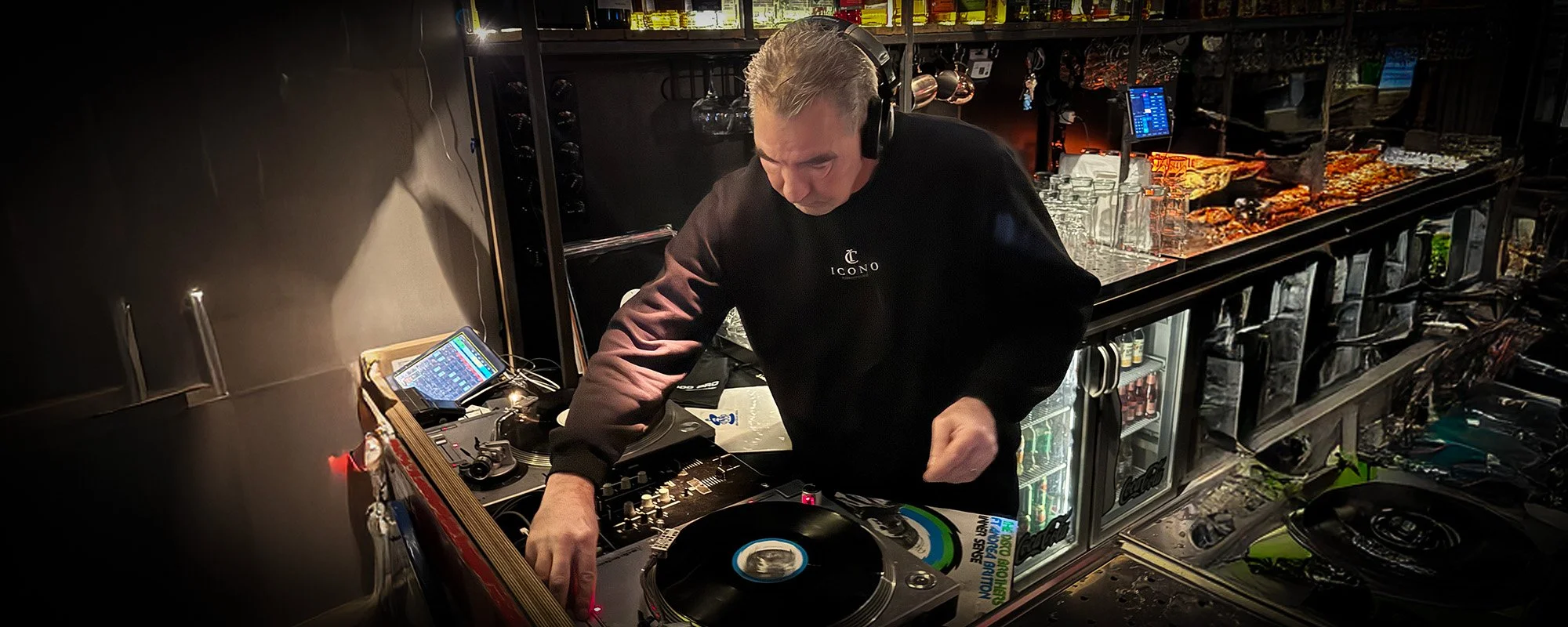 DJ Jaimy playing a live DJ set at Amsterdam Vinyl Club, a community event in Amsterdam