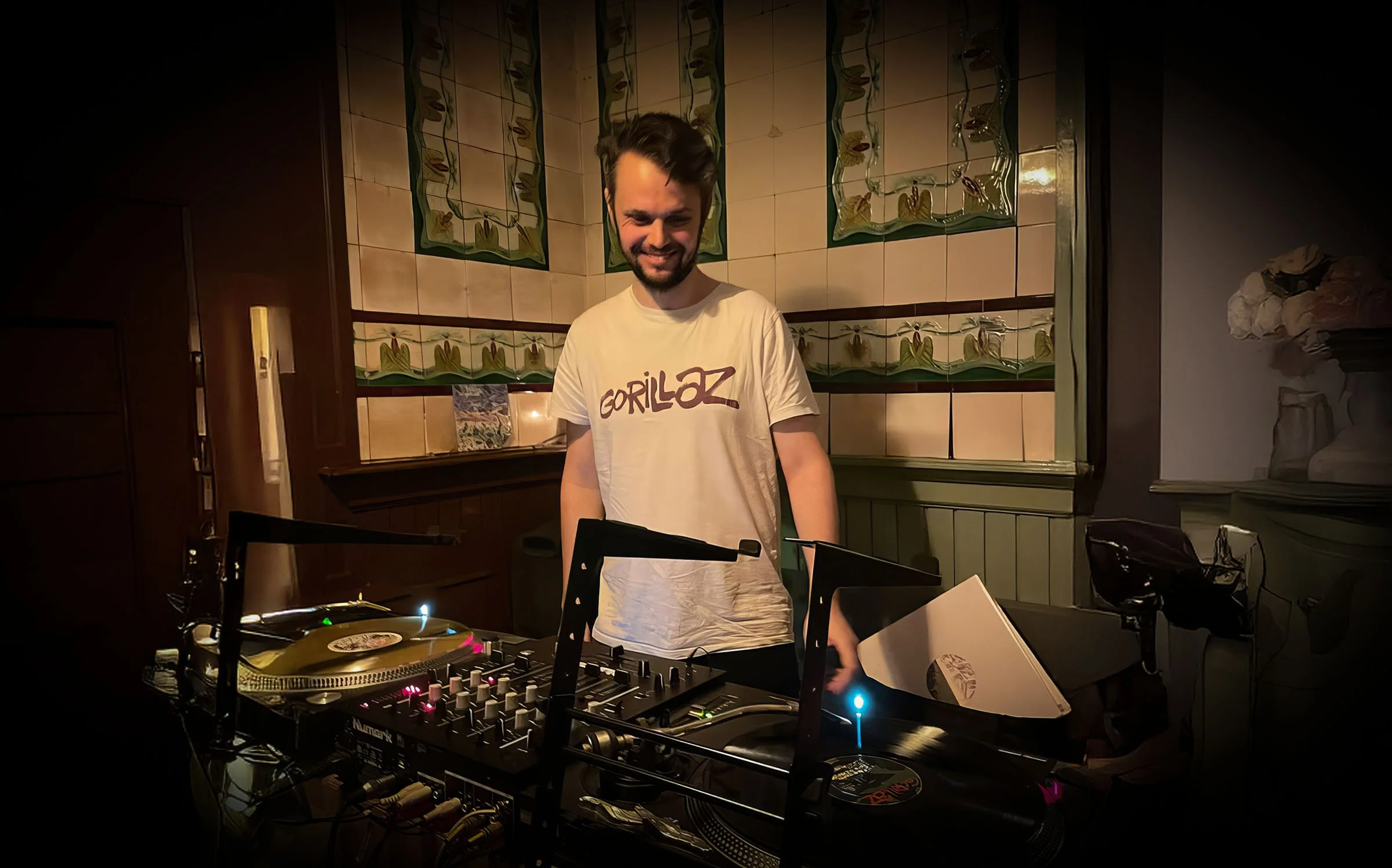 DJ Boudewijn at the turntables playing a guest DJ set at Amsterdam Vinyl Club, a live music community event.