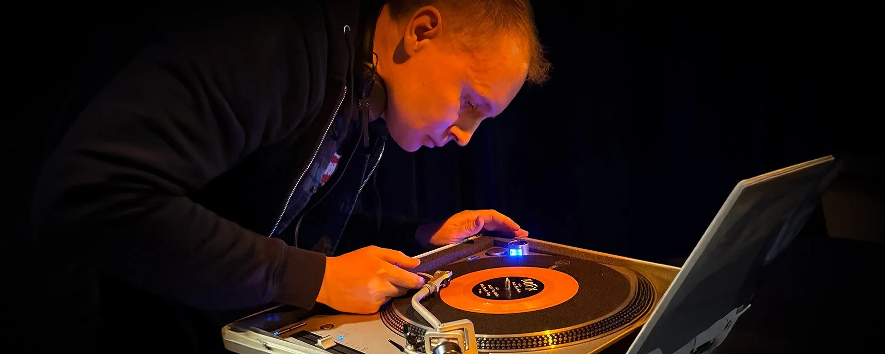 DJ Cherry Cola on the decks, DJing at Amsterdam Vinyl Club - a community event for music lovers and collectors in Amsterdam.