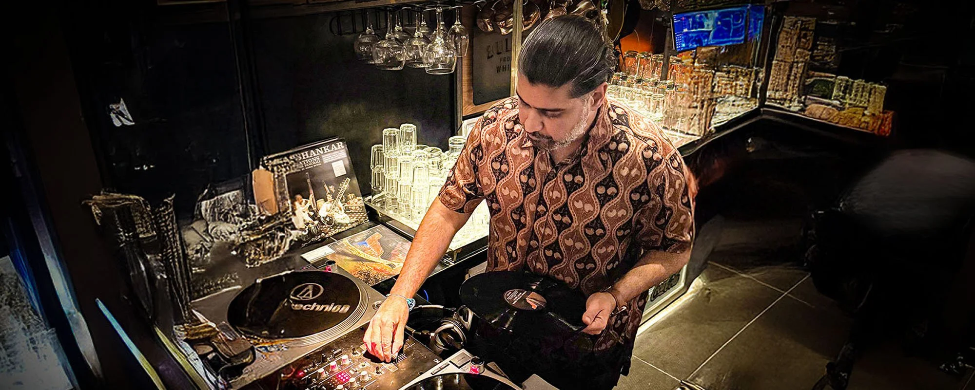 Deepak Nichani playing a guest DJ set at Amsterdam Vinyl Club, a community music event held in venues across the city.