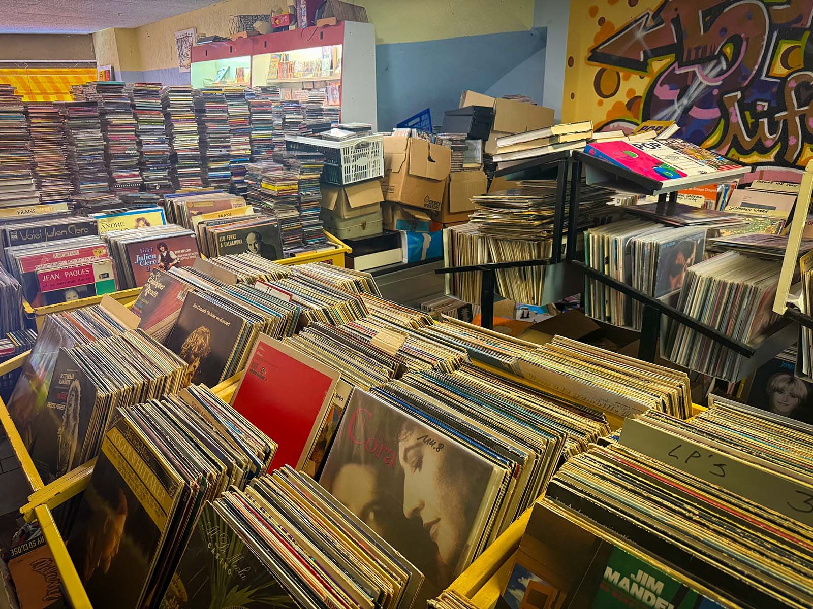 Interior of Second Life Music, a record store in Amsterdam. The photo is from an interview with the store by Amsterdam Vinyl Club. Amsterdam Vinyl Club is a community event in the city for collectors, DJs and anyone who loves music on vinyl.