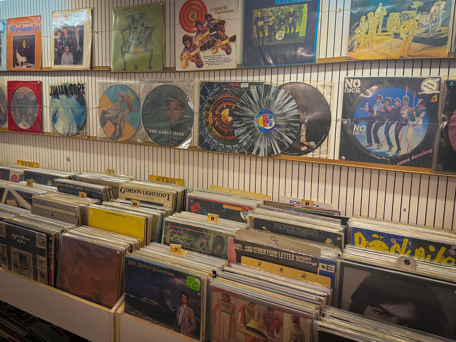 Interior of Second Life Music, a record store in Amsterdam. The photo is from an interview with the store by Amsterdam Vinyl Club. Amsterdam Vinyl Club is a community event in the city for collectors, DJs and anyone who loves music on vinyl.