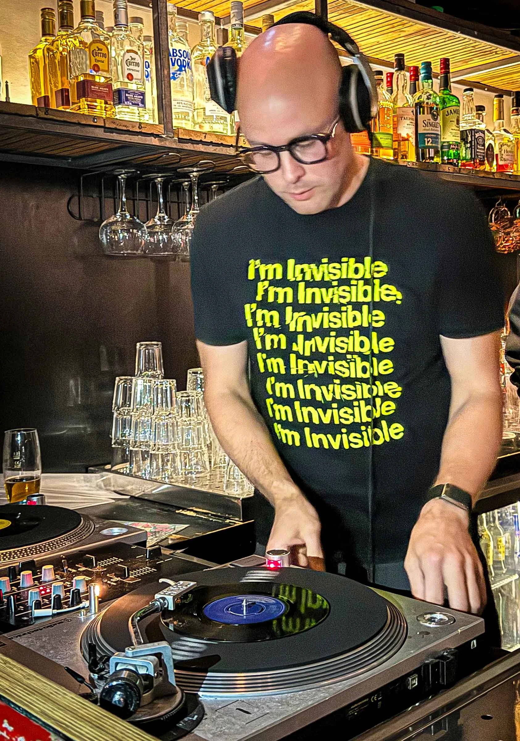 Rob at the turntables playing a guest DJ set at Amsterdam Vinyl Club, a live music community event.