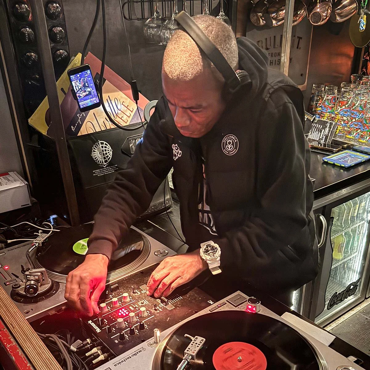 DJ Fresh at the turntables playing a guest DJ set at Amsterdam Vinyl Club, a live music community event.