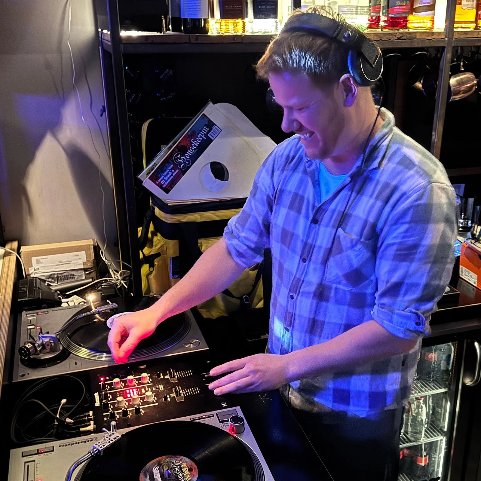 Walter Vooys at the turntables playing a guest DJ set at Amsterdam Vinyl Club, a live music community event.
