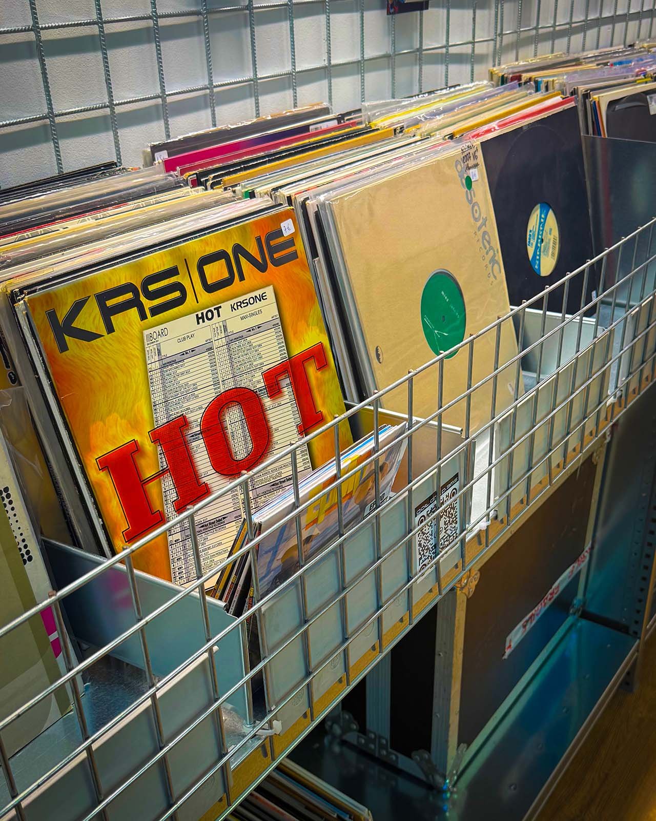The interior of GOT.DRIP Streetwear and Records, a vinyl and clothing store in Amsterdam, Netherlands. There are hundreds of vinyl records on display.