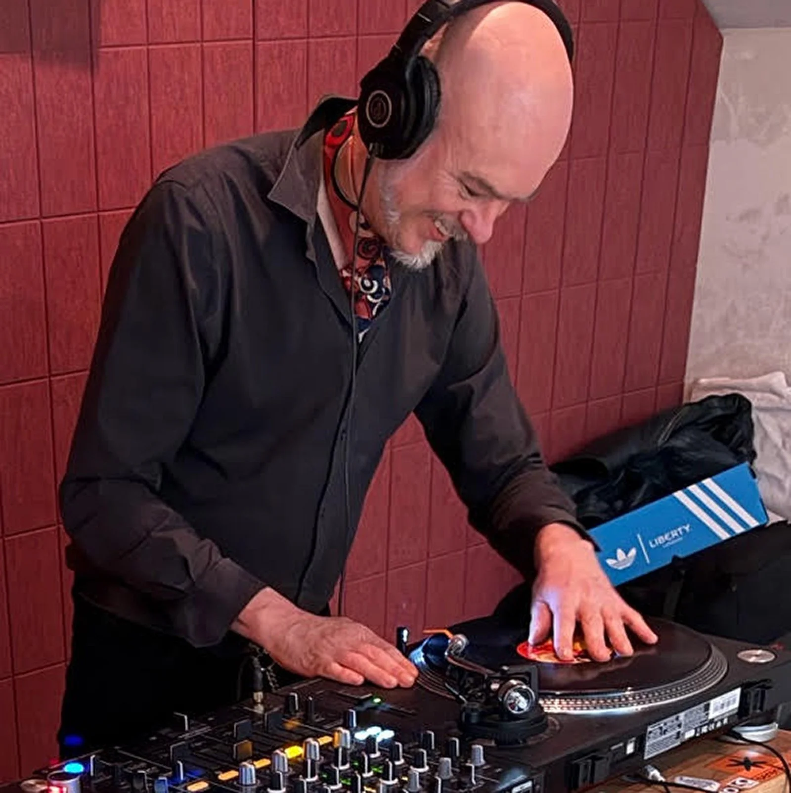 Brother Boogaloo at the turntables playing a guest DJ set at Amsterdam Vinyl Club, a live music community event.