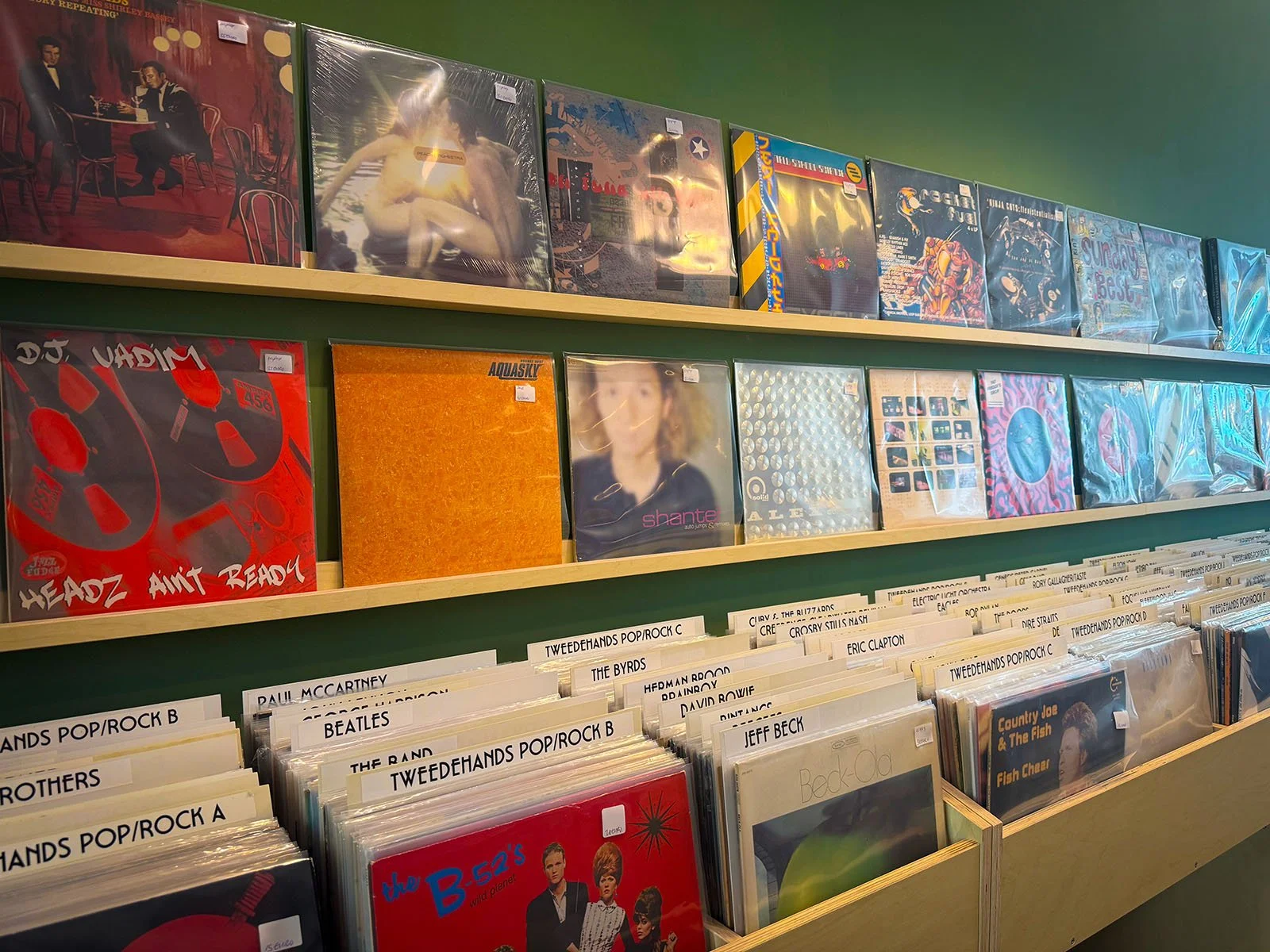 The interior of Anton Speijers Platen, a vinyl store in Amsterdam, Netherlands. There are hundreds of vinyl records on display.