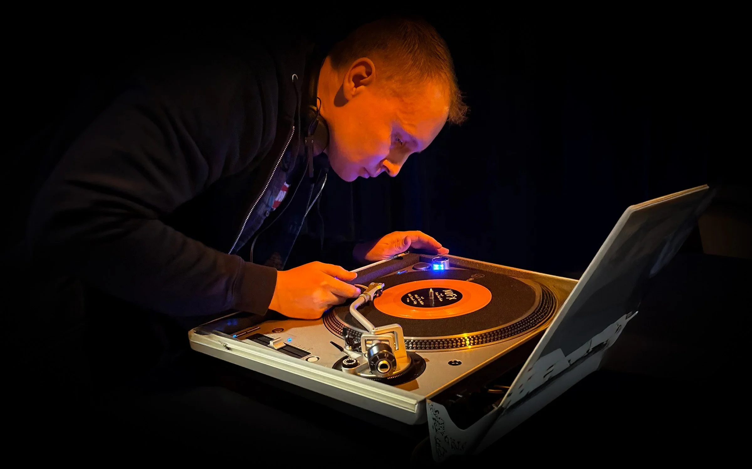 DJ Cherry Cola on the decks, DJing at Amsterdam Vinyl Club - a community event for music lovers and collectors in Amsterdam.