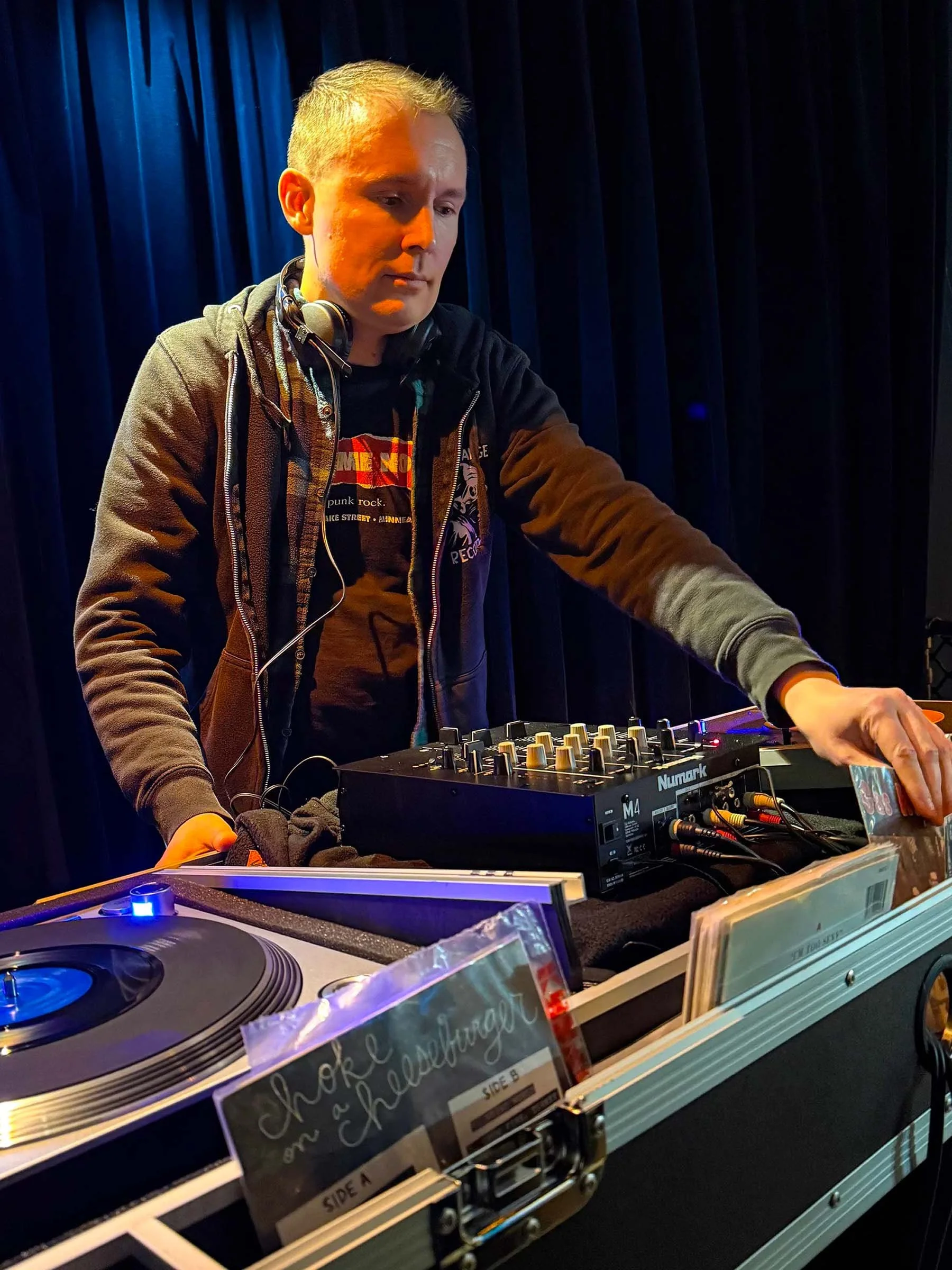 DJ Cherry Cola at the turntables playing a guest DJ set at Amsterdam Vinyl Club, a live music community event.