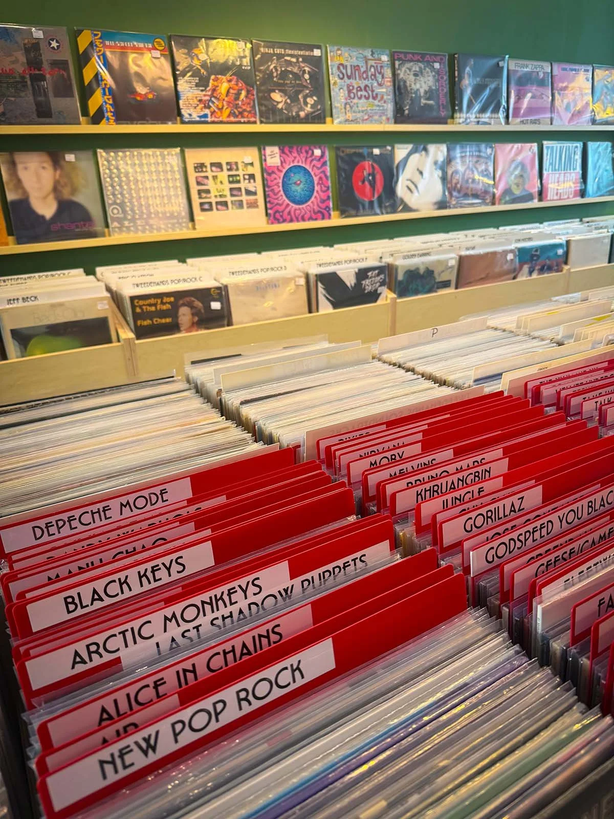 The interior of Anton Speijers Platen, a vinyl store in Amsterdam, Netherlands. There are hundreds of vinyl records on display.