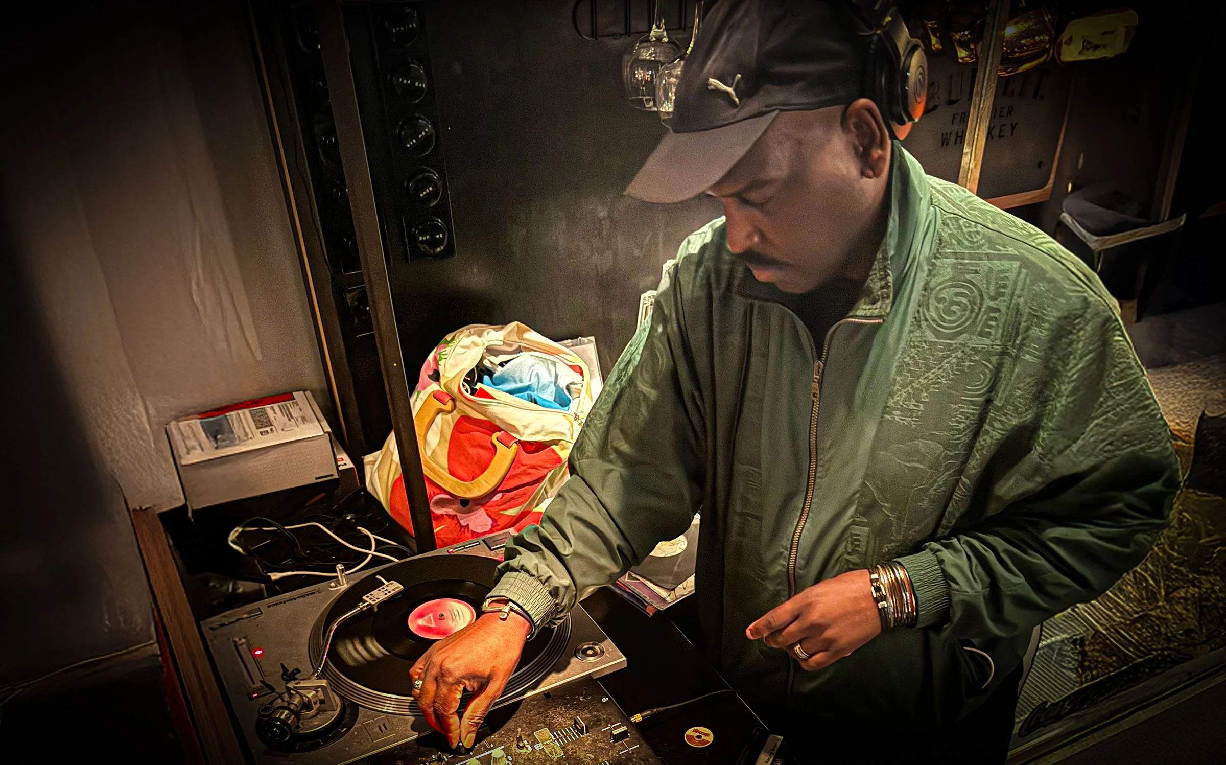 DJ Tea & 2 Sugars at the turntables playing a guest DJ set at Amsterdam Vinyl Club, a live music community event.