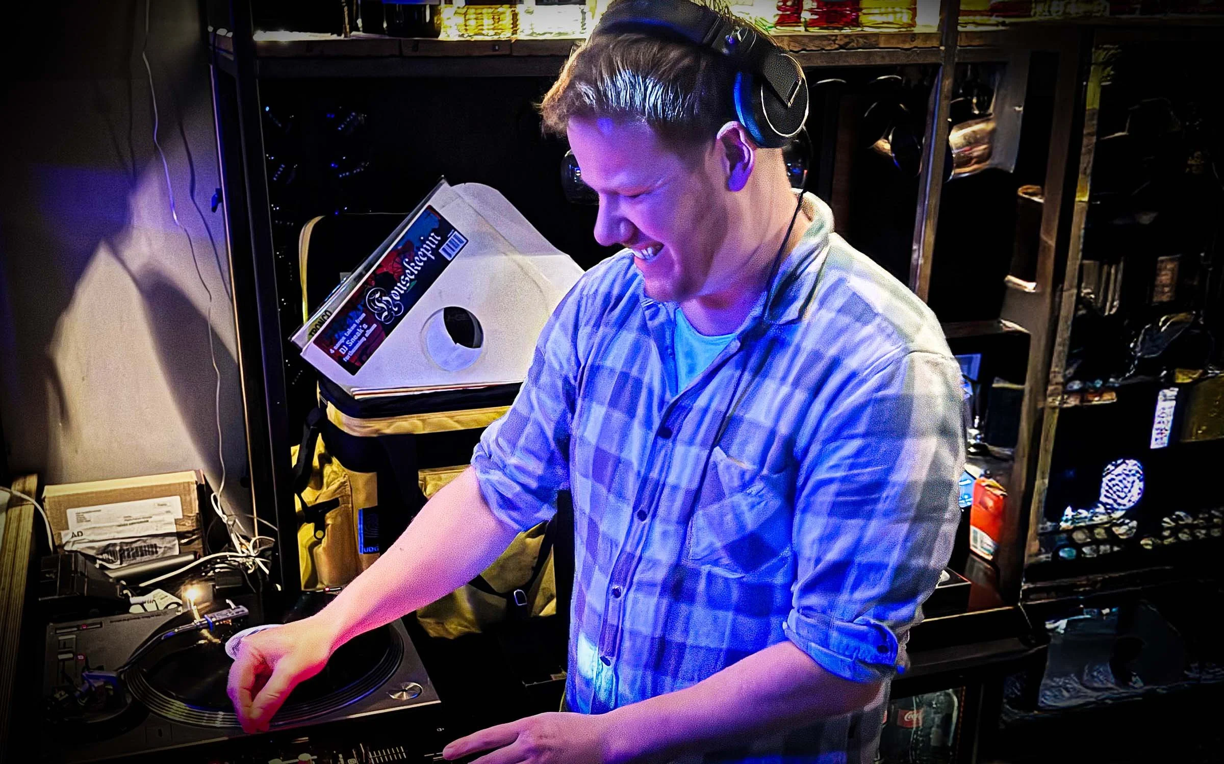Walter Vooys at the turntables playing a guest DJ set at Amsterdam Vinyl Club, a live music community event.
