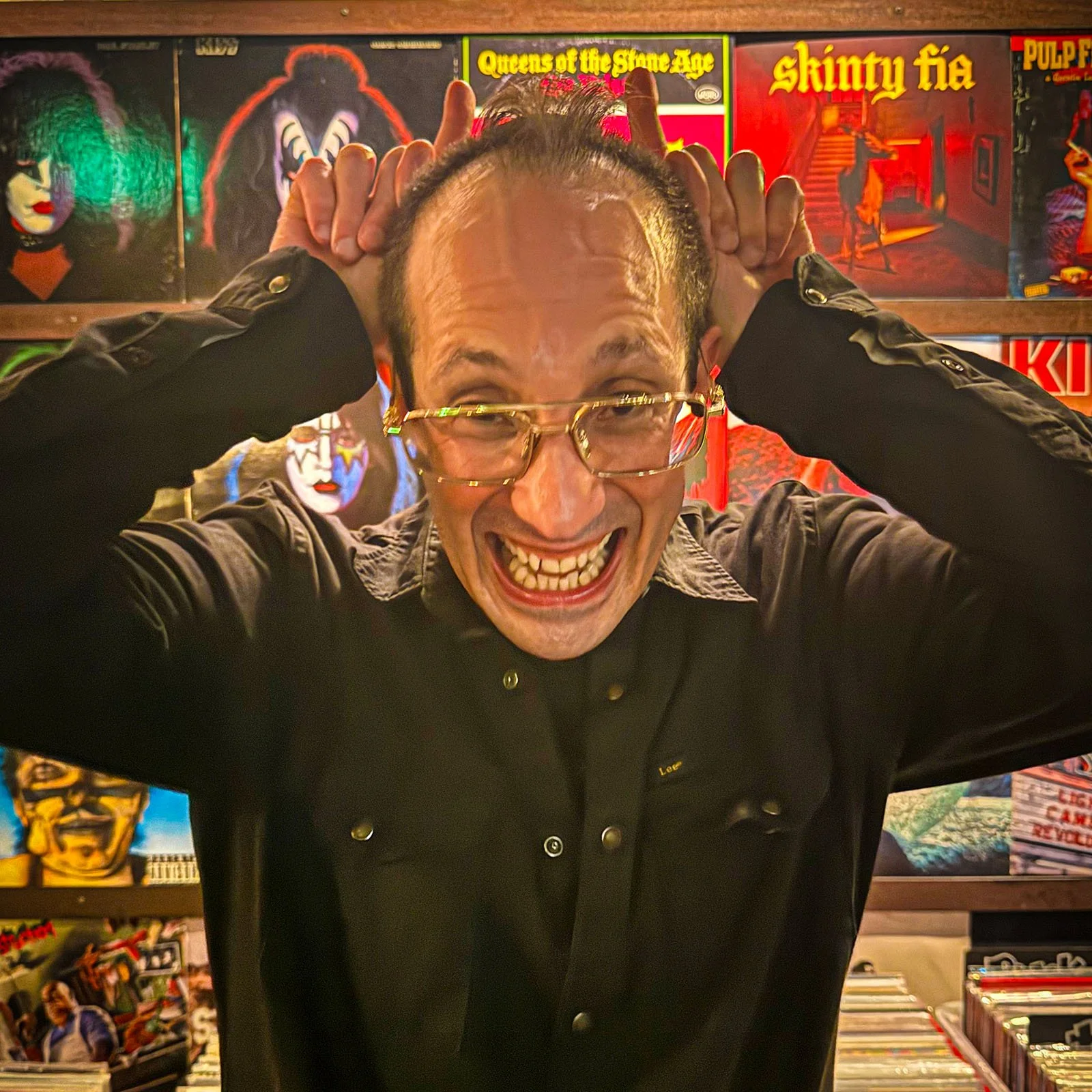 Mr Rock playing a guest DJ set at Amsterdam Vinyl Club, a live music community event.
