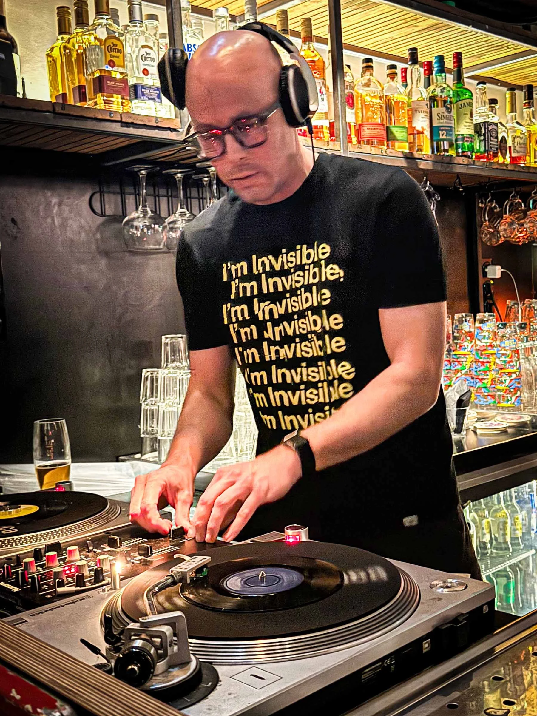 Rob at the turntables playing a guest DJ set at Amsterdam Vinyl Club, a live music community event.