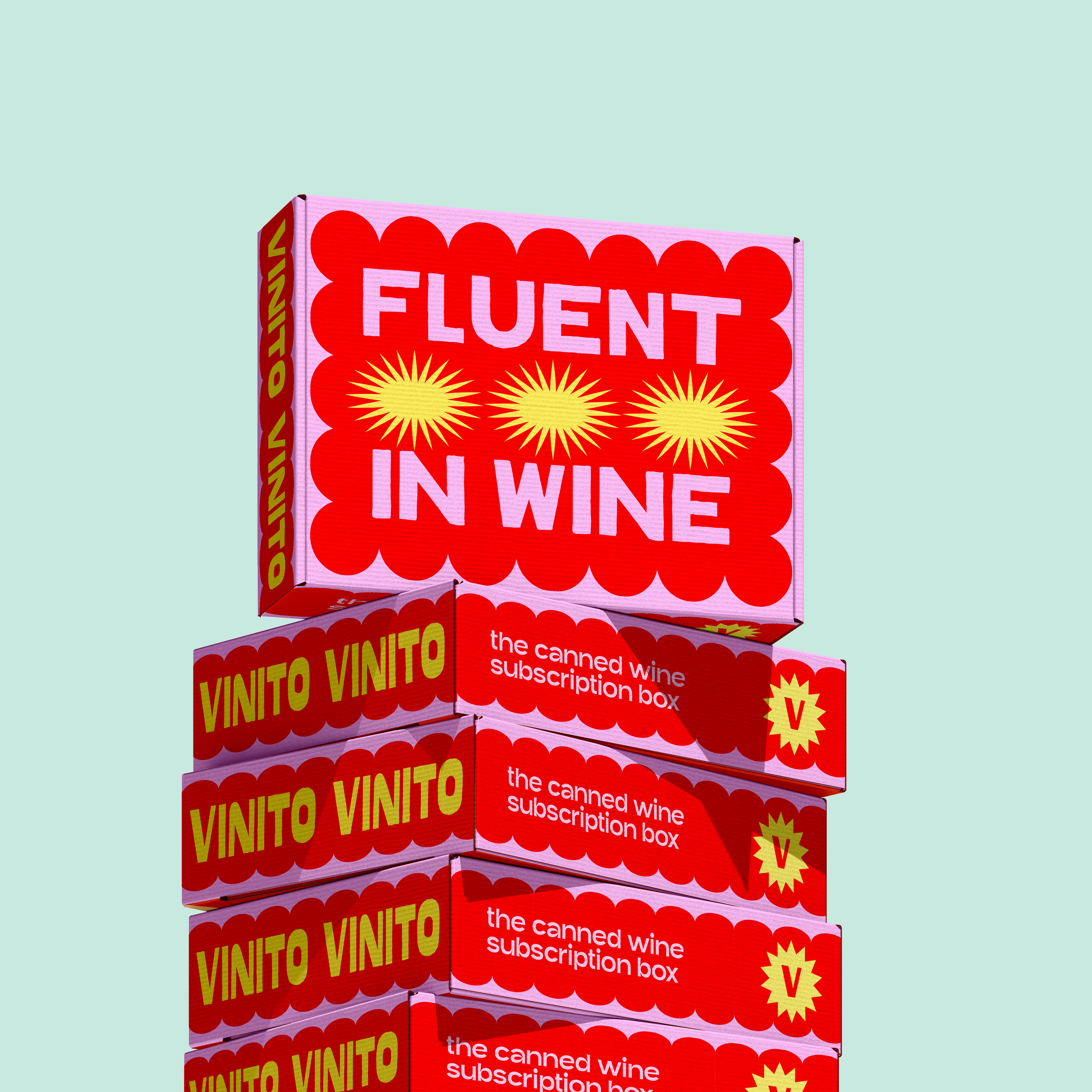 Stack of red boxes labeled "Vinto Vinto" and "the canned wine subscription box," with a large pink sign on top reading "Fluent in Wine" featuring three yellow starburst shapes.